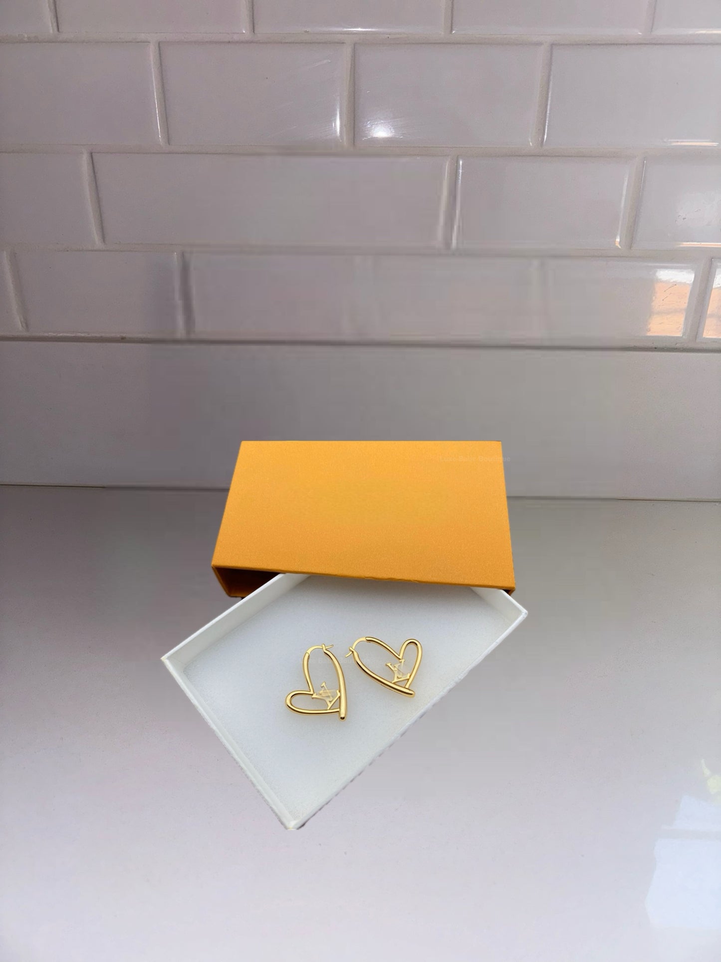 LV Heart hoop earrings